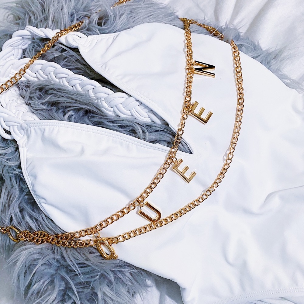 Brand New/ Never Worn White low back bathing suit.